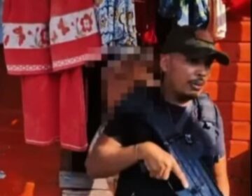 Dupla que arrancou filho do colo e matou pai é presa