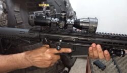 Arma com mira a laser é apreendida em embarcação