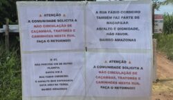 Com ruas precárias, moradores improvisam barreiras para conter caminhões