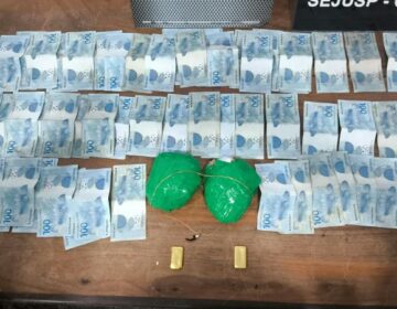 Mulher é detida com cocaína, R$ 7 mil e R$ 150 mil em ouro em praça de Macapá
